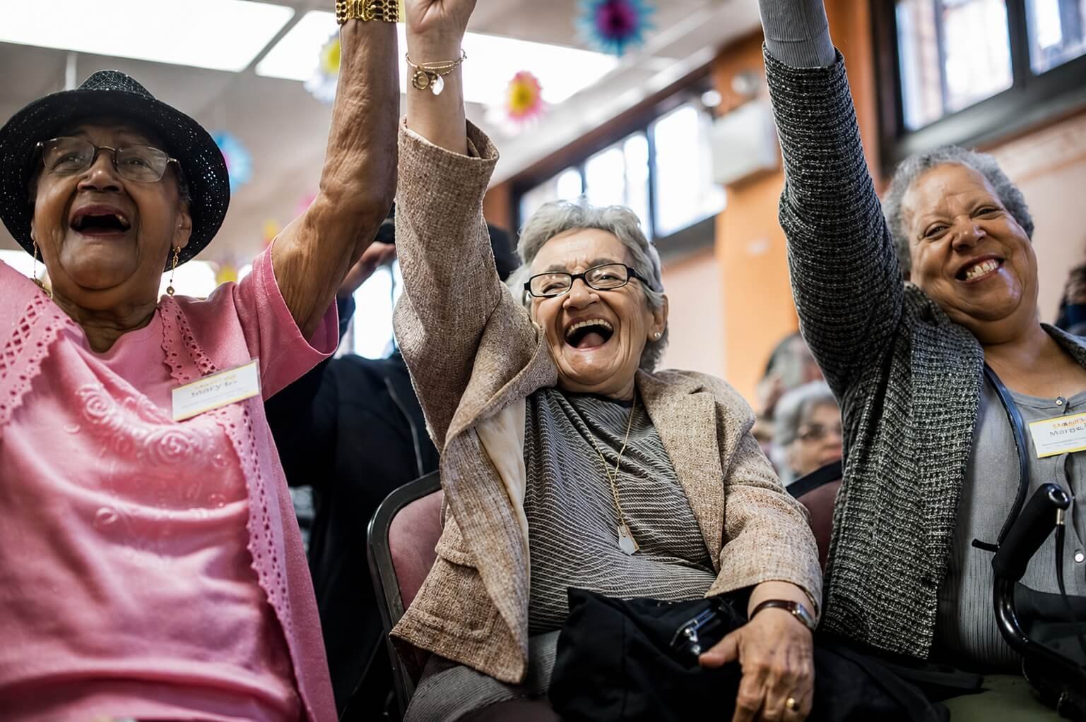 Members cheering together at a centre celebration